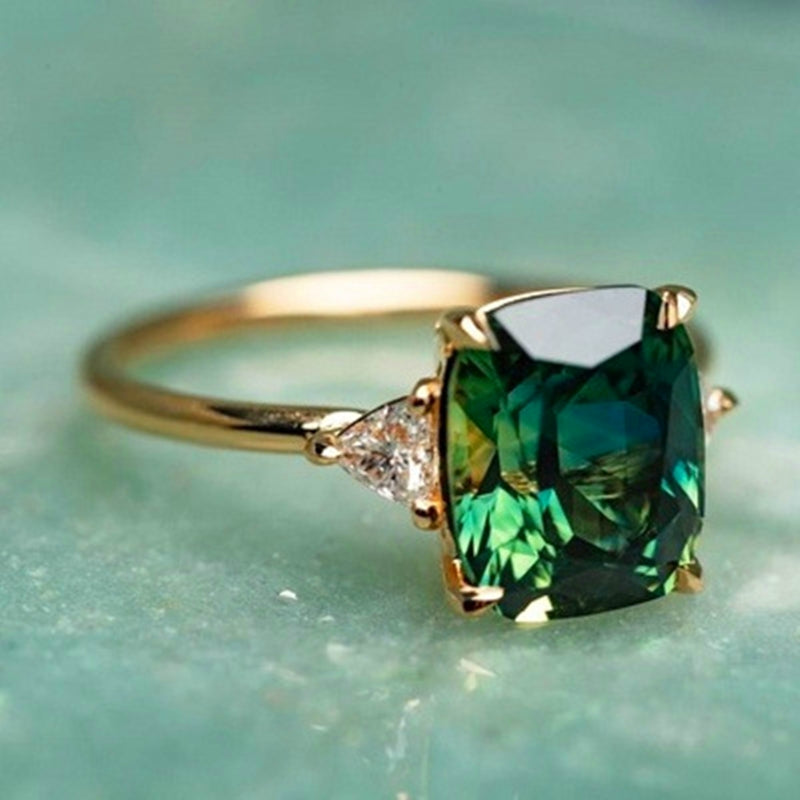 LUCK | Anello dorato con zircone verde